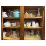 Contents of 4 kitchen cabinets: Pyrex, cups,