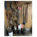 Group of yard tools, hand tools, ice melt, pipe