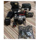 4 vintage cameras and flash: Canon AE-1 with