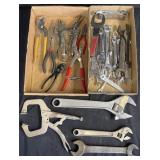 Collection of wrenches, vice grips, players and