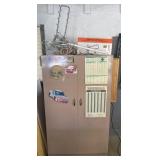 Metal shop cabinet & contents: auto manuals,