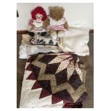 Group of quilts and stuffed animals