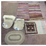 Group of mats, bathroom lid covers (some new) and