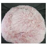 Small, pink dog/cat bed