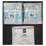 Baby size 6M cardigans and size 9M pajama sets.