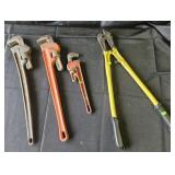 Bolt cutters and Ridgid pipe wrenches