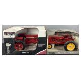 2 toy tractors in boxes: Farmall 656 &