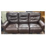 Dual reclining leather couch, 85ï¿½ x 36ï¿½ x 39ï¿½