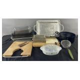 Group of kitchenware: baking dishes, cutting