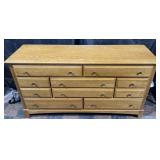 Oak dresser with 10 drawers, paneled sides &