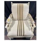 Wood carved armchair with nailhead trim and front