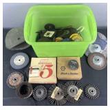 Group of grinding wheels, sanding discs, stringer