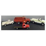 4 toy trucks, Tonka pick up, Dixie equipment and