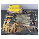 Collection of hand saws and mitre boxes