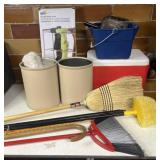 Group of cleaning supplies, wastebaskets, boot