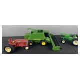 2 toy tractors and combine:
