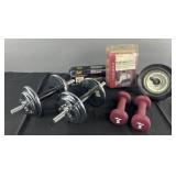 Group of dumbbells, wrist/ankle weights, back