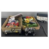 Group of toy cars, tractors, trucks and more