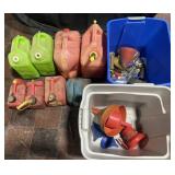 8 gas cans, funnels and gas can accessories