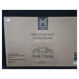 Welcome Mat. Storefront