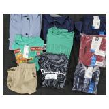 Boy's size 8 rain jacket, shirts and shorts. Size