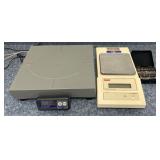 2 digital scales and set of calibrating weights,