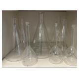 Collection of Pyrex lab glass in 2 cabinets