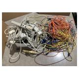 Collection of power strips, extension cords and