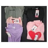 Women's size X-Large sweaters and shirts. Most