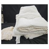 Comforter Set out of package. Size unspecified