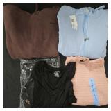 Women's size Large Champion hoodies and shirts.
