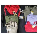 Women's size Medium dresses and shirts. Most NEW