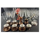 Group of glassware, cups, saucers & more