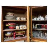 Contents of 2 upper kitchen cabinets, plates,