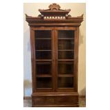 Antique Eastlake Victorian bookcase, carved