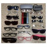 Group of sunglasses and reading glasses