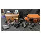 Group of vintage cameras, lenses, flashes bags