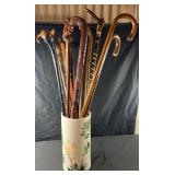 Group of canes and oriental porcelain stand