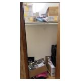 Contents of bedroom closet, doll wigs and