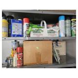 Contents of 2 top shelves: bug spray, gardening
