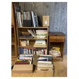 Bookcase, side table and collection of books