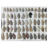 Collection of Native American arrowheads in