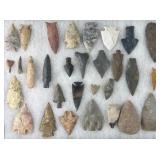 Collection of Native American arrowheads and