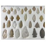 Collection of Native American arrowheads in