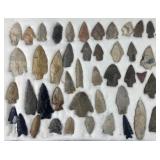 Collection of Native American arrowheads in