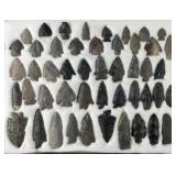 Collection of Native American arrowheads in