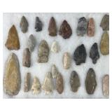 Collection of Native American arrowheads in