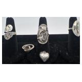 4 Sterling rings and pendent, sizes: 4, 5, 6 & 7,