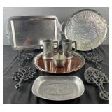 Group of metal tableware, trays, trivits,
