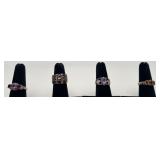 4 Sterling rings, 2 with garnets and 2 with
